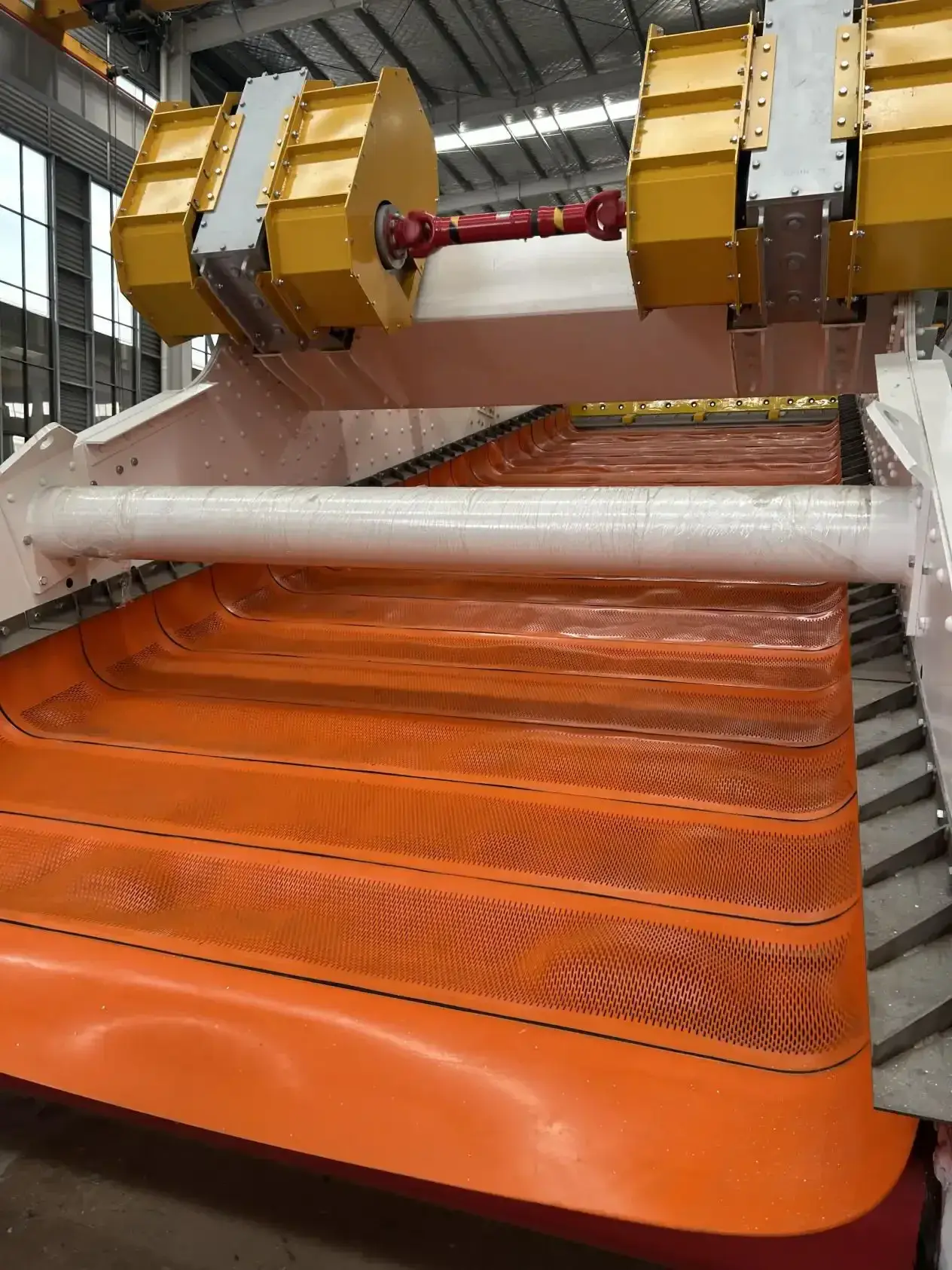 Orange Flip-Flow polyurethane panels in a representative screening system.