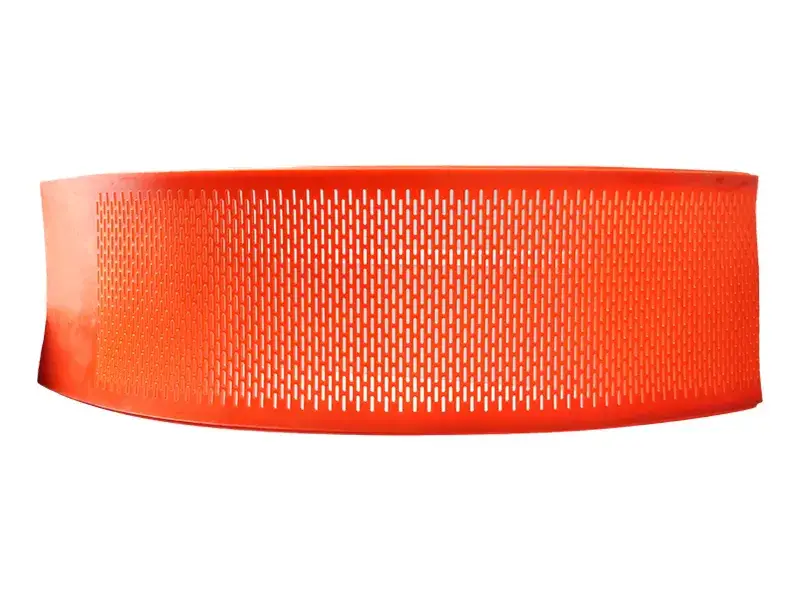 Orange flexible polyurethane Flip-Flow screen panel with fine apertures.