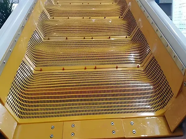 Flip-Flow polyurethane screen mats with visible retention points in an installed screen deck.