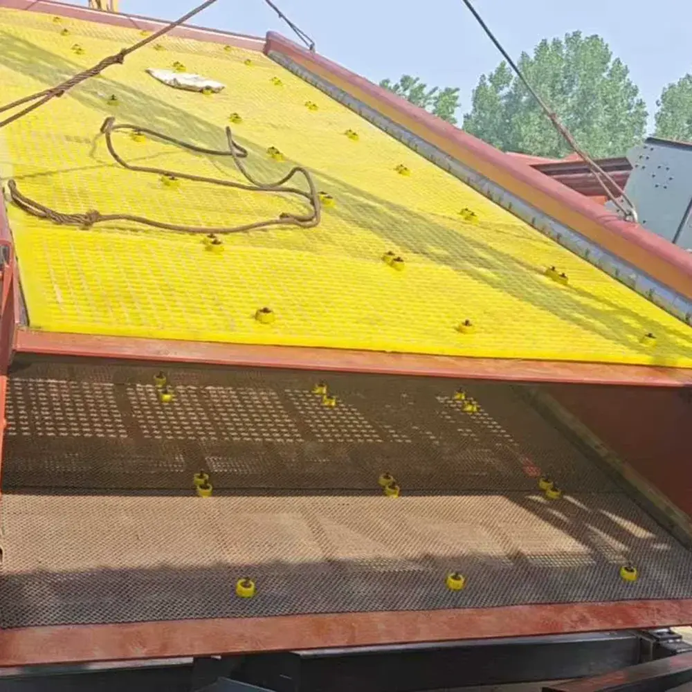 Installed yellow modular polyurethane screen panels on a deck frame.