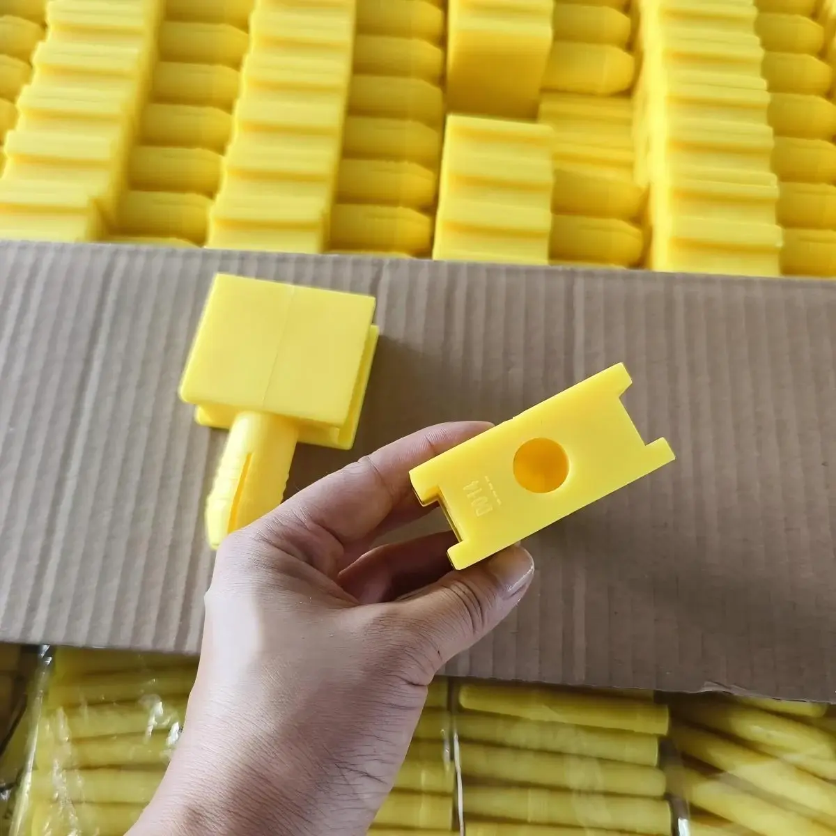 Yellow polyurethane fixing pin components for a modular screen panel fastening arrangement
